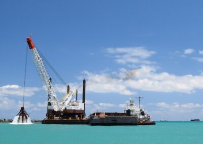 The Dredge Virginian loads a scow with sand from the impoundment basin during the 2018 St. Lucie Inlet maintenance dredging event