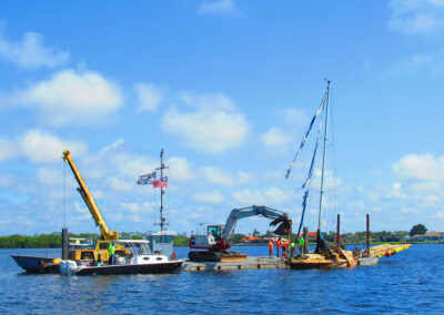 Raising a sunken sailboat from the bottom of the Caloosahatchee River